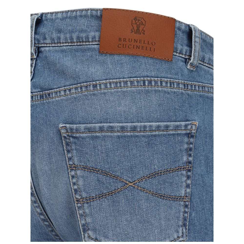 Brunello Cucinelli blaue Baumwoll-Jeans im geraden Schnitt mit Lederpatch und Umschlag am Saum