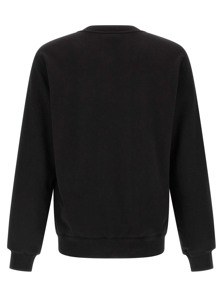 Dolce & Gabbana black cotton sweatshirt with heraldic chest patch and ribbed cuffs