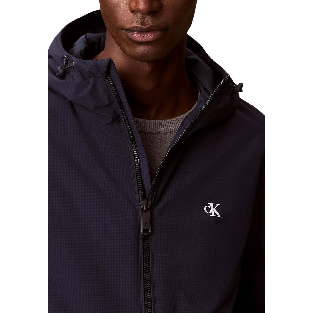 Calvin Klein Jeans Blaue Jacke aus recyceltem Polyester in voller Länge