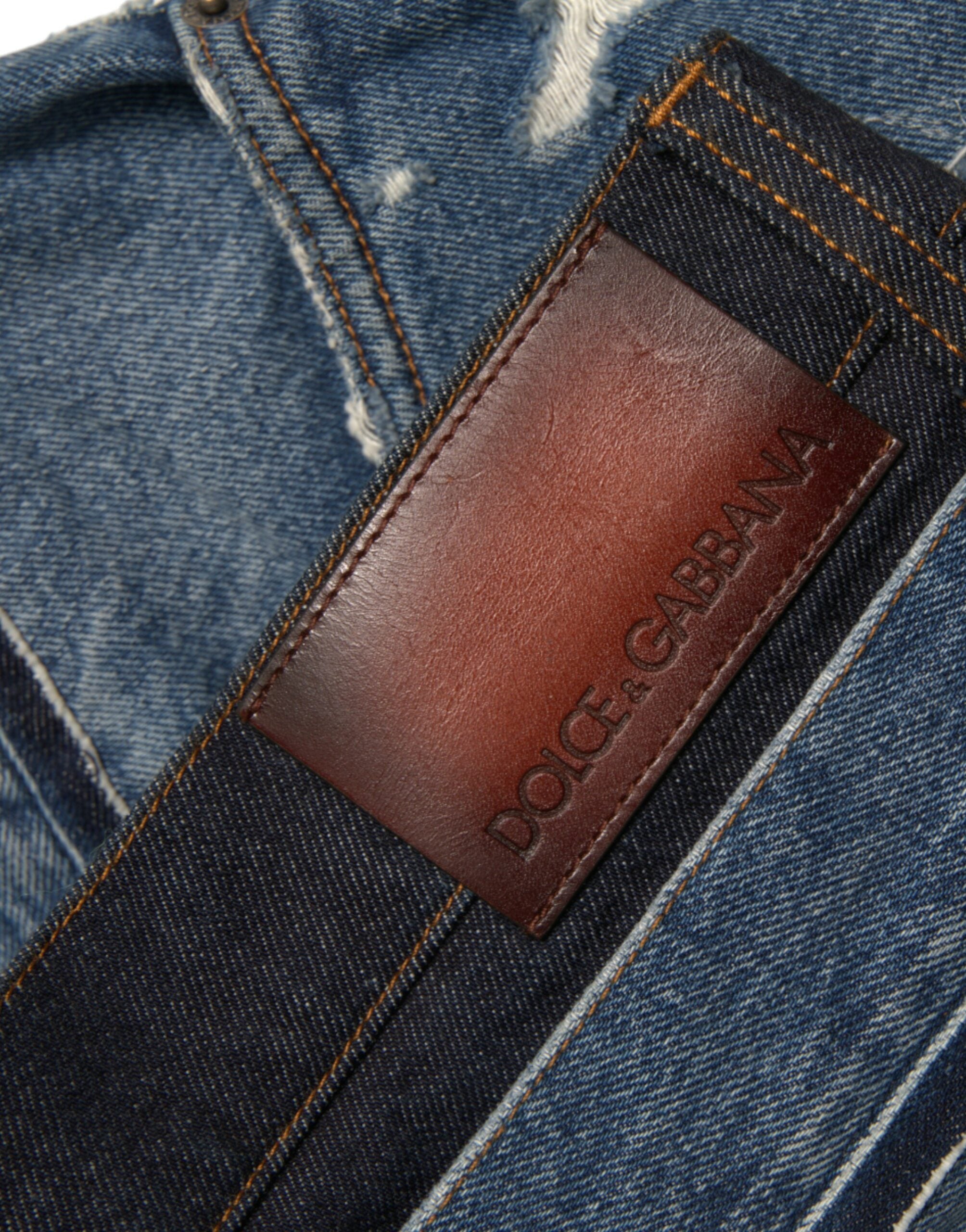 Dolce & Gabbana Blaue zerfledderte Baumwolle Männer Denim Jeans