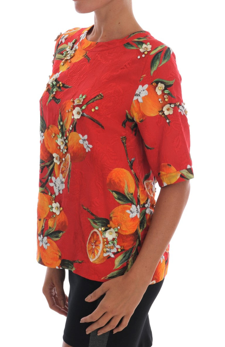 Dolce & Gabbana Orangefarbene Bluse mit Kristallverzierung