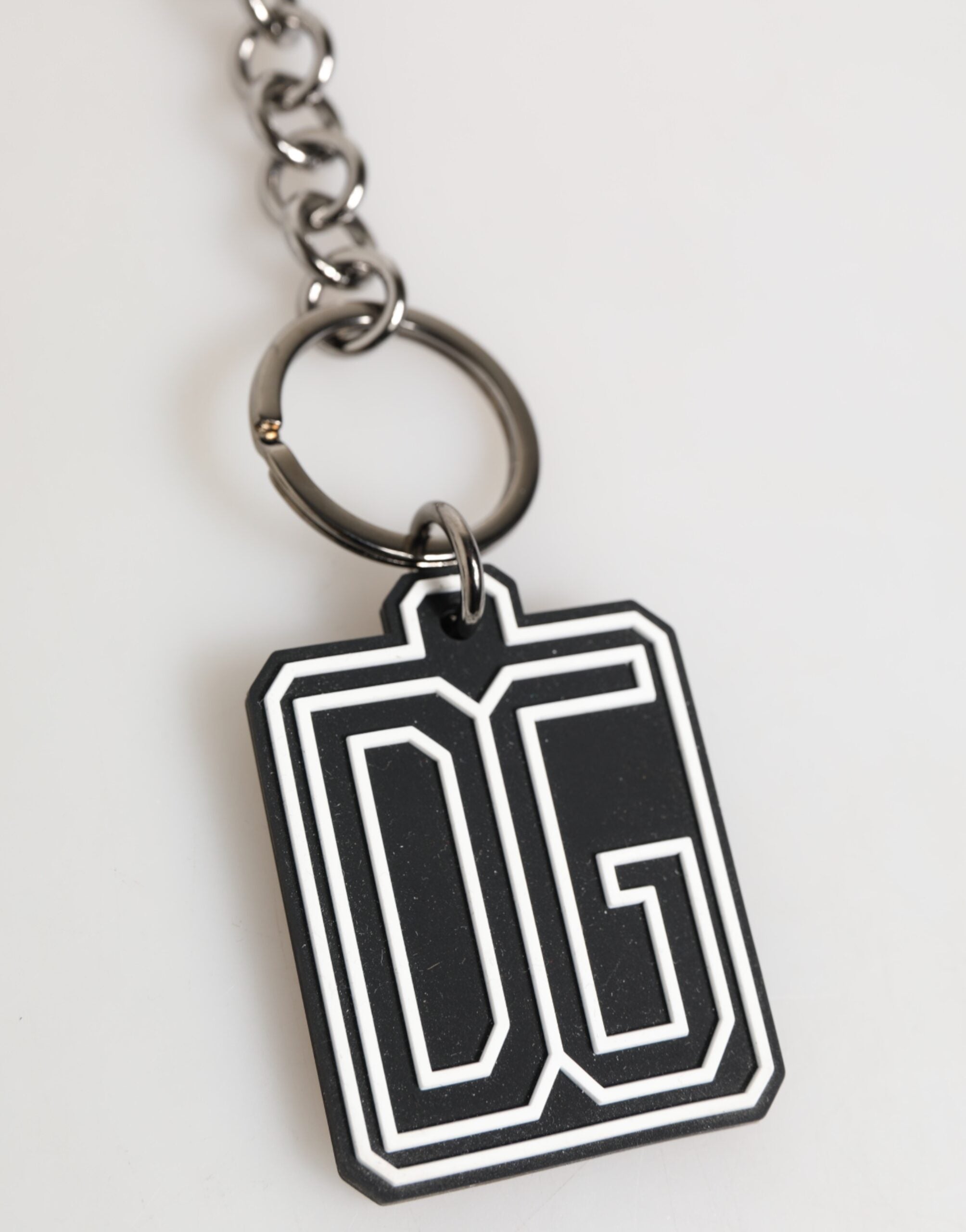 Dolce & Gabbana Schwarz Weiß DG Gummi Logo Silber Herren Schlüsselanhänger
