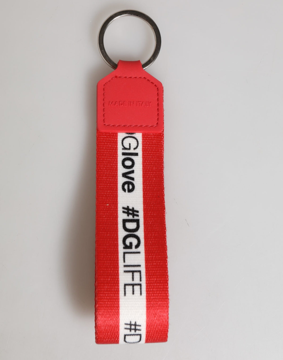 Dolce & Gabbana polyester keychain with red logo, silver brass holder