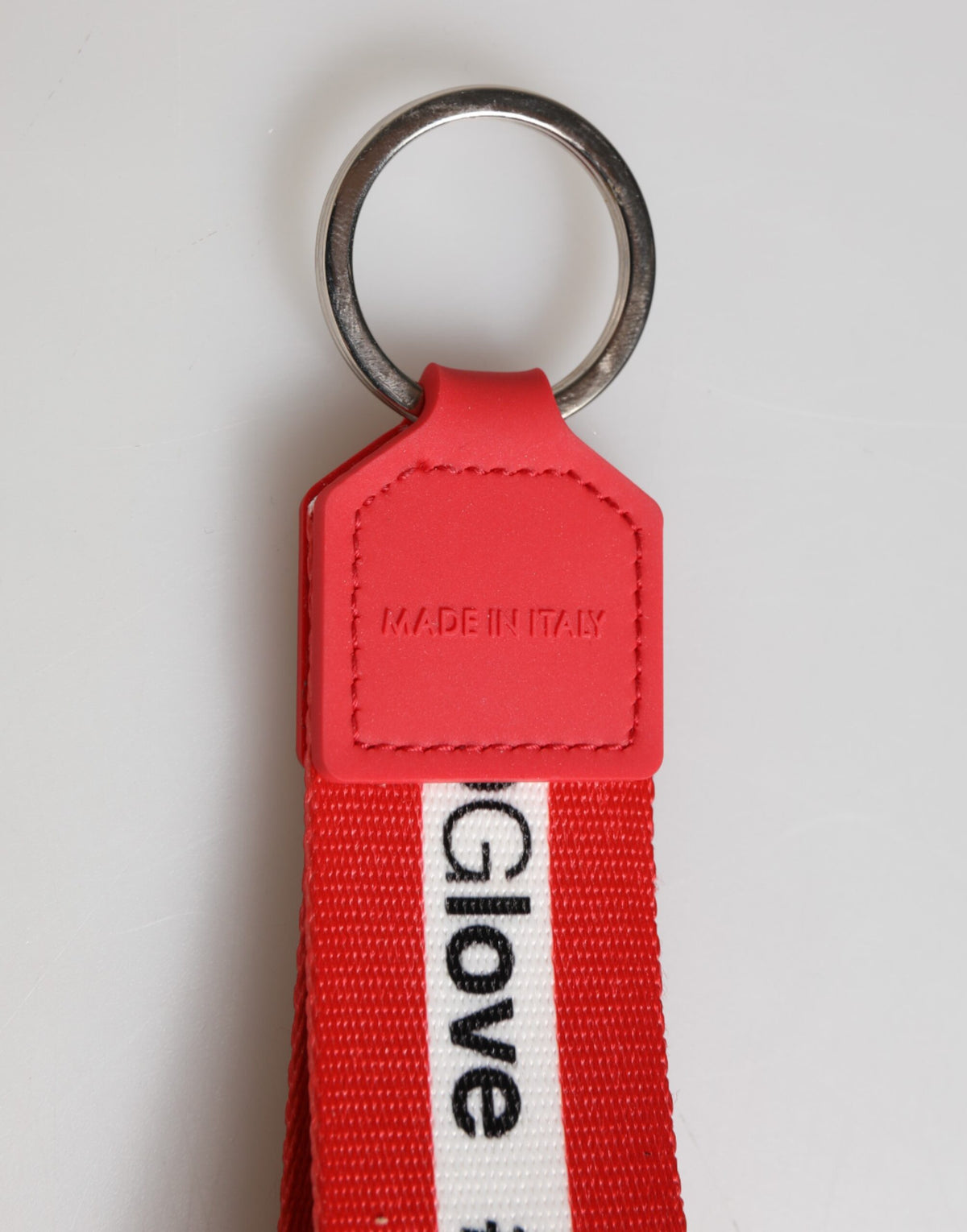 Dolce & Gabbana polyester keychain with red logo, silver brass holder